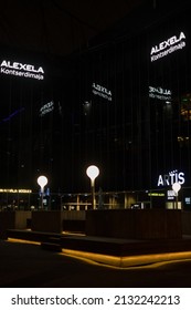 Tallinn, Estonia - 3.2.2022: Alexela Concert Hall Building Light Sign At Night. Alexela Kontserdimaja (Alexela Concert Hall) Logo. Largest Conference Venue In Tallinn.