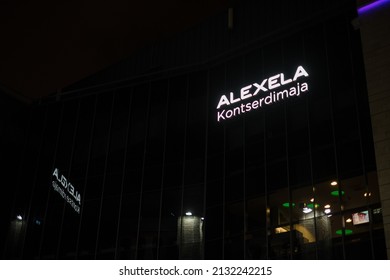 Tallinn, Estonia - 3.2.2022: Alexela Concert Hall Building Light Sign At Night. Alexela Kontserdimaja (Alexela Concert Hall) Logo. Largest Conference Venue In Tallinn.