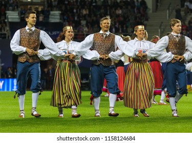 TALLINN, ESTONIA - AUGUST 15, 2018: Estonian National Dancers During The Match 2018 UEFA Super Cup Real Madrid - Atletico At The Stadium A. Le Coq Arena