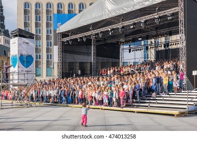 TALLINN, ESTONIA - AUGUST 19, 2016: Day of Restoration of Independence. Big choir singing anthem of Estonia on Freedom square