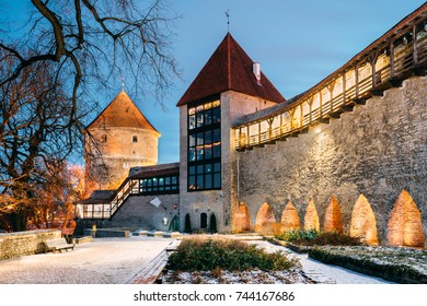 Tallinn, Estonia. Former Prison Tower Neitsitorn In Old Tallinn. Medieval Maiden Tower In Winter Evening Or Night Illumination.