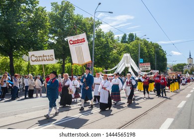 Tallinn, Estonia - JUL 06, 2019: People Walk On Parade During Estonian Song Festival