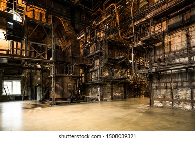 Tallinn / Estonia - September 18 2019: An Industrial-looking Historic Building Which Is Creative Hub Today. Old Wall Full Of Rusty Constructions From Pre-war Period Power Plant Boiler Room.  