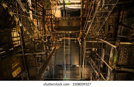 Tallinn / Estonia - September 18 2019: An Industrial-looking Historic Building Which Is Creative Hub Today. Old Wall Full Of Rusty Constructions From Pre-war Period Power Plant Boiler Room.  