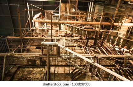 Tallinn / Estonia - September 18 2019: An Industrial-looking Historic Building Which Is Creative Hub Today. Old Wall Full Of Rusty Constructions From Pre-war Period Power Plant Boiler Room.  