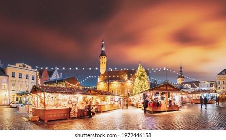 Tallinn, Estonia. Traditional Christmas Market On Town Hall Square. Trading Houses With Sale Of Christmas Gifts. Night Sky Above Famous Landmark. Altered Night Sky. Panorama, Panoramic View. - Powered by Shutterstock