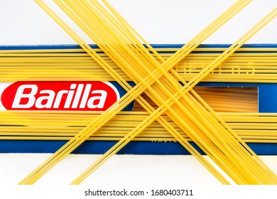 Tallinn/Estonia - 03.23.2020: Barilla Whole Wheat Pasta Spaghetti Package, Whith Some Spagetti Strings, Placed On The Top Of The Package, In Parallels And Crossings.