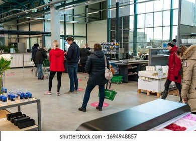 Tallinn/Estonia-04.04.2020: Hortes Shopping Center. People Keeping Distance In Shop. Social Distancing In Shopping Queue. Keeping 2m From Other People In Shop. Corona Virus . Covid 19 Rules.