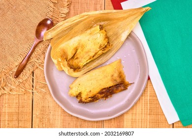 Tamal De Mole Poblano (mole Poblano Tamale) With Pork On A Brown Plate. Top View. Traditional Mexican Food.