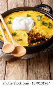 Tamale Pie And Casserole Dish In The Cuisine Of The Southwestern United States. It Is Prepared With A Cornmeal Crust And Meat Ingredientscloseup On The Pan. Vertical
