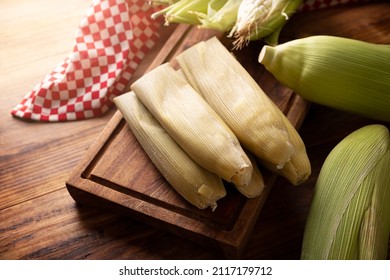 Tamales de Elote, also called Uchepos. Typical Mexican dish. Can be served with green salsa and accompanied by sour cream or served as a dessert covered with caramel or any other sweet topping