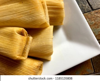 Tamales On A White Plate, Overhead View