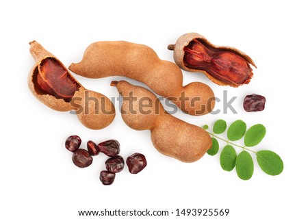 Tamarind fruit with leaf and seed isolated on white background, Top view. Flat lay