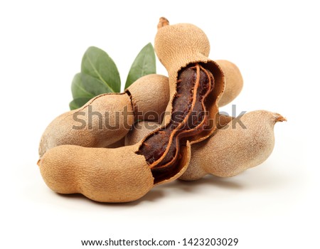 Tamarind tropical fruit with leaf isolated on white background