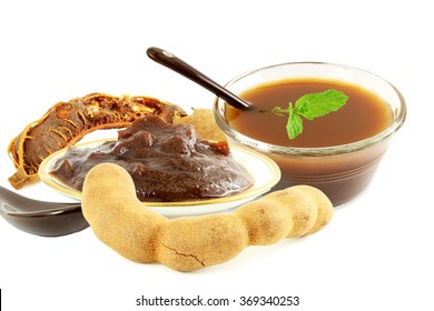 Tamarind With Tamarind  Water Juice Concentrate Chutney Pulp Or Paste On White Background