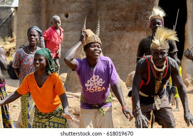 TAMBERMA VIL, TOGO - JAN 13, 2017: Unidentified Tammari Men And Women With National Attributes Dance In The Village. Tammaris Are Ethnic Group Of Togo And Benin