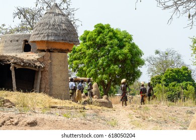 TAMBERMA VIL, TOGO - JAN 13, 2017: Unidentified Tammari People Stand Near The Clay House In The Village. Tammaris Are Ethnic Group Of Togo And Benin