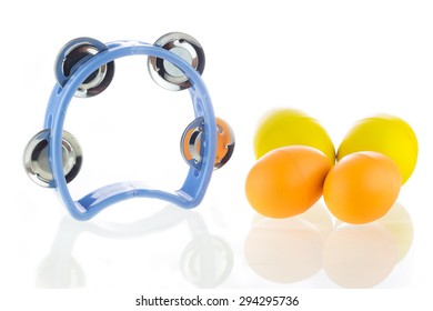 Tambourine And Egg Maracas Shaker On A White Background.