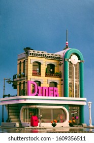 Tambov, Russian Federation - January 03, 2020 Lego Downtown Diner building against blue background. Studio shot.