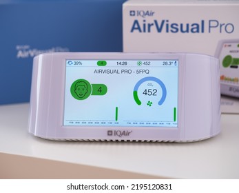 Tambov, Russian Federation - July 30, 2022 An AirVisual Pro Air Quality Monitor With Information About The Air Quality And Co2 Standing On A Table Infront Of Its Packaging