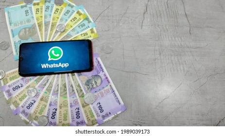 Tamil Nadu, India - January 21 2021:Indian Currency Notes Along With Whatsapp Logo Depicting Whatsapp Pay