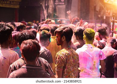 Tamilnadu, India  March 18 2022: Teenagers Crowd Celebrate Colorful Holi Festival
