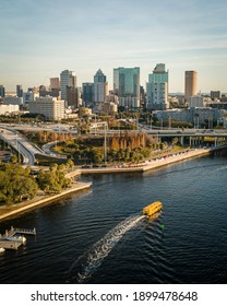 "Tampa, FL USA - 1-20-2021: Vertical aerial shot over the Hillsborough river leading to downtown Tampa."