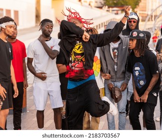 Tampa, FL - USA - April 3, 2022: Group Of Teens Having Fun, Freestyle Hip Hop Dancing At The Tampa, Florida Riverwalk