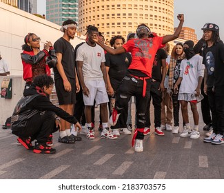 Tampa, FL - USA - April 3, 2022: Group Of Teens Having Fun, Freestyle Hip Hop Dancing At The Tampa, Florida Riverwalk