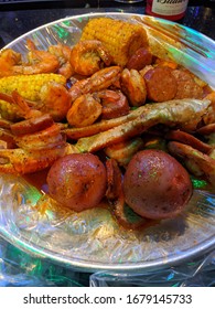 Tampa, FL / USA - February 26, 2020: Mr & Mrs Crab Seafood Restaurant - Seafood Boil Combo With Seasoned Shrimp, Sausage, Potatoes, Corn On The Cob, Alaskan Snow Crab Seasoned To Perfection.