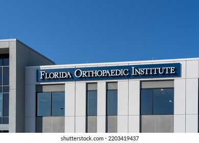 Tampa, FL, USA - January 8, 2022: Florida Orthopaedic Institute Sign On The Building In Tampa, FL, USA. Florida Orthopaedic Institute Is An American Center Of Orthopedic Care, Education And Research.
