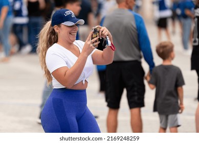 Tampa, FL - USA - June 18, 2022: Tampa Bay Lighting Fan Outside Amalie Arena Taking A Photo Before Game 2 Against The Colorado Avalanche