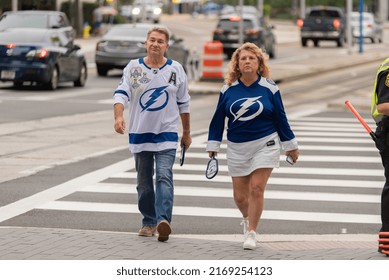 Tampa, FL - USA - June 18, 2022: Tampa Bay Lighting Fans Crossing The Street Near Amalie Arena Before Game 2 Against The Colorado Avalanche