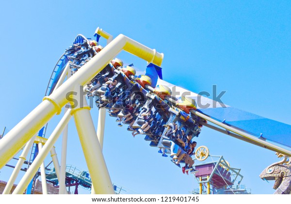 Tampa, Florida. October 25, 2018 Amazing Montu\
Rollercoaster  having a train with open cars that moves along a\
high at Bush Gardens Tampa\
Bay.