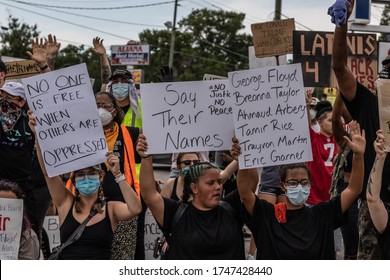 Tampa, Florida / USA - 5/31/20: Protesters Peacefully Kneeling While Chanting 