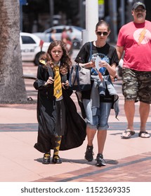 Tampa, Florida / USA - August 4, 2018: Young Girl Dressed In A Harry Potter Costume With Her Mother Outside The Tampa Convention Center During Comic Con