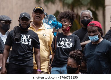 Tampa, Florida / USA - June 13, 2020: Young African American Female Siging At The Black Live Matter Black Clergy United March For Justice In Tampa, Florida.