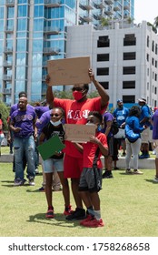 Tampa, Florida / USA - June 14, 2020: Kappa Alpha Psi Fraternity Member With His Kids At National Pan Hellenic Council (NPHC) At The Black Lives Matter Peaceful Protest In Tampa, Florida.