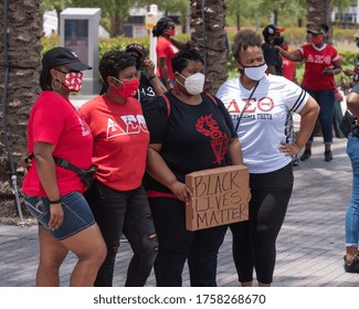 Tampa, Florida / USA - June 14, 2020: Delta Sigma Theta Sorority Sisters Holding A 