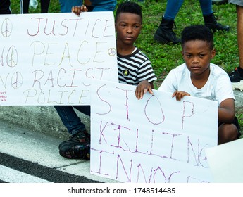 Tampa, Florida / USA - June 2 2020: Children hold signs at a George Floyd protest in Tampa, Fl. 