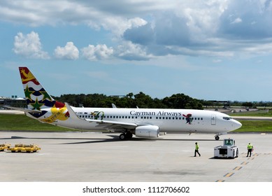 Tampa International Airport Florida USA. 2018. A Cayman Airways  Passenger Jet Preparing To Taxi From The Apron.