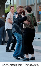 Tampere Finland 06/26/2012 
West Coast Swing Dancers Dancing In A Small Square In The Middle Of The City