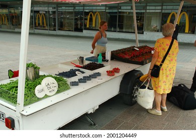 Tampere, Finland - June 23 2021: Documentary Of Everyday Life And Place. Berry Street Vendor In The City Center.