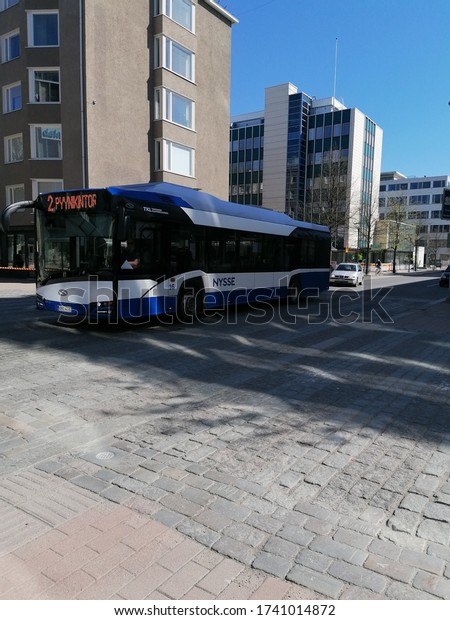 Tampere, Finland - May 22 2020: The new\
Solaris Urbino electric bus runs in the city\
center.
