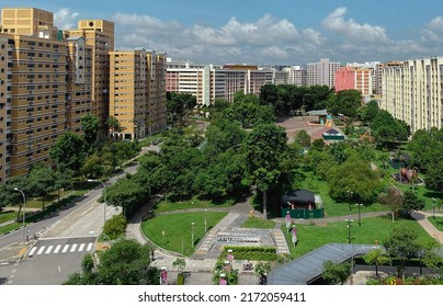Tampines, Singapore,-Circa March 2022,- A high elevation shot of Tampines Town Central Park , that have jogging track,dog park , fitness corner and a basketball court, for resident to use and mingle.