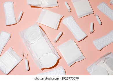 Tampons, Feminine Sanitary Pads Pattern On Pink Background. Hygiene Care During Critical Days. Menstrual Cycle. Caring For Women's Health. Monthly Protection, Hard Shadow, Copy Space