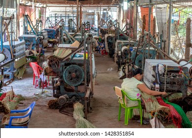 TAN CHAU, VIETNAM  - FEBRUARY 16, 2019:  Vietnamese Woman Making Rattan Carpet.