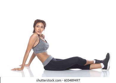 Tan Skin Asian Fitness Girl In Sexy Cute Sport Bra Black Spandex Pants Exercise Warm Up In White Studio Room, So Tire But No Give Up Concept