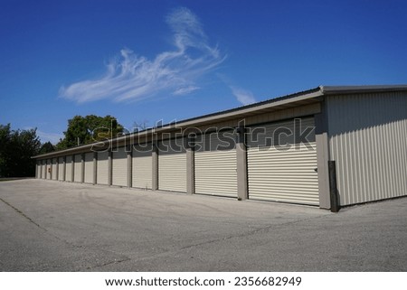 Tan storage units holding the owner's property.