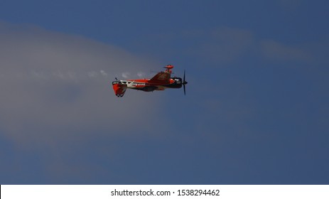 TANAGRA, GREECE, SEPTEMBER 21, 2019. Aerobatic Aircraft Sukhoi Su-26MX Of The Dutch Rush Team, Flying Upside-down During AFW (Athens Flying Week) 2019